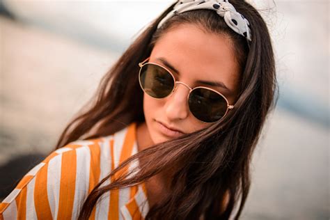 Close Up Of A Woman Wearing Sunglasses Stock Photo Download Image Now