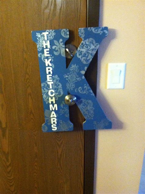 Hobby lobby letters, paint, wood glue, and a stencil creates unique