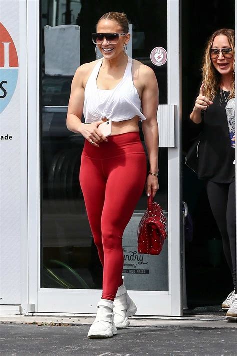 Jennifer Lopez Shows Off Her Fab Figure In A White Crop Top And Red Leggings As She Arrives At