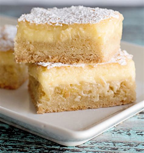 The cake is more like a bar and uses ingredients like cream cheese, cake mix, and sugar. Paula Deen's Ooey Gooey Butter Bars | Recipe | Ooey gooey ...