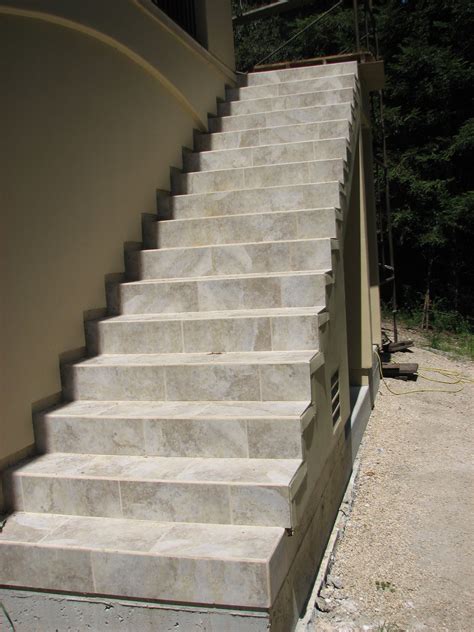 Staircases are a great place to increase the value of your home with new stone and tile fixtures. Tiled stairs by Central Coast Tile. http ...