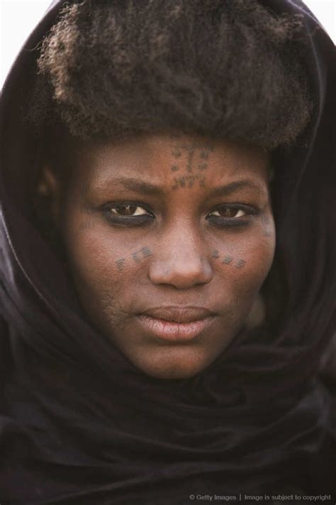 Portrait Of Woman From Wodaabe Tribe With Tribal Tattoos On Her Face Niger West Africa