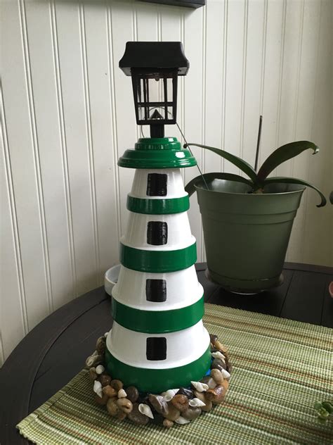 Green And White Lighthouse Made From Clay Pots Terra Cotta Pot Crafts
