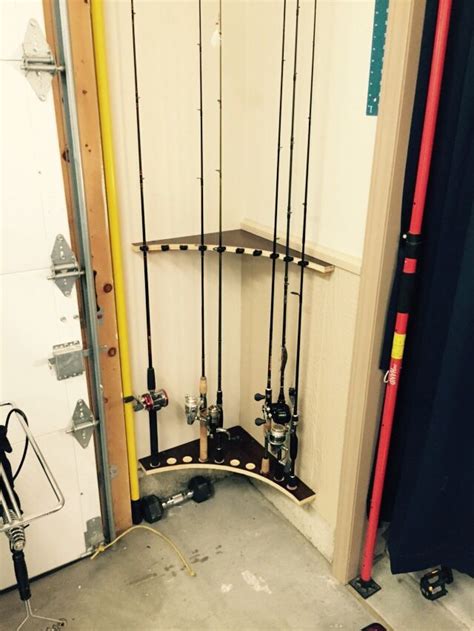 How to hang fishing rods in the garage? Fishing pole rack, Garage organization, Garage storage ...