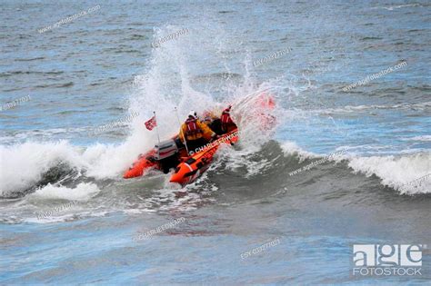 Lifeboat Dinghy Racing Against Waves In North Sea In Display Of