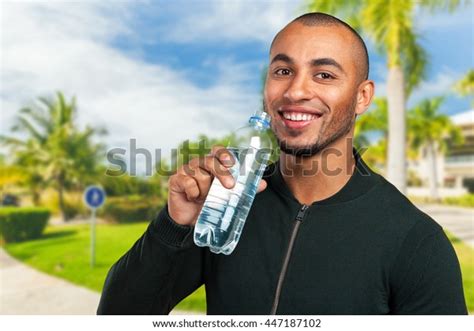 Young Cool Black Man Drinking Water Stock Photo Edit Now 447187102