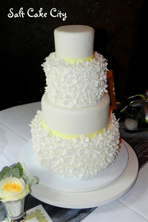 Extra Tall Flower Covered Tiered Wedding Cake