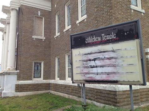 lansing police bust man allegedly behind swastika graffiti at several old town buildings