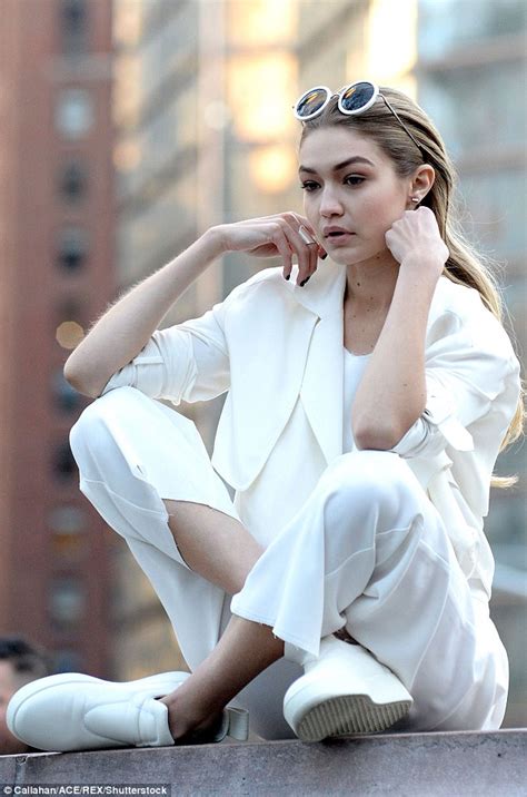Gigi hadid @gigihadid & luigi and iango @luigiandiango. Gigi Hadid poses for Maybelline photo shoot in New York ...