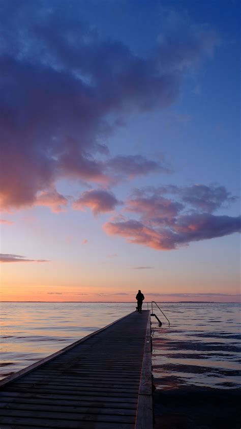 Download Wallpaper 2160x3840 Pier Sea Silhouette Loneliness Horizon