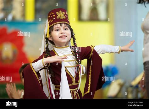 A Girl In A National Georgian Costume Is Dancing Stock Photo Alamy