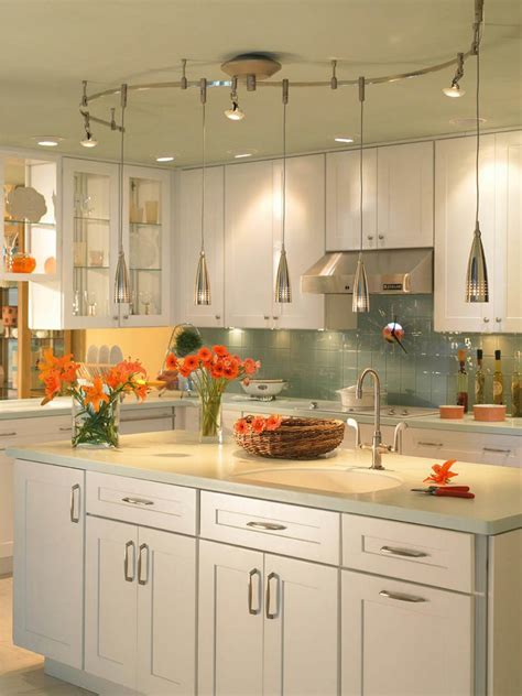 Whether you're looking for a low hanging chandelier, an intricately designed pendant lamp or a ceiling track of spotlights, you'll find plenty to. Kitchen Lighting Design Tips | DIY