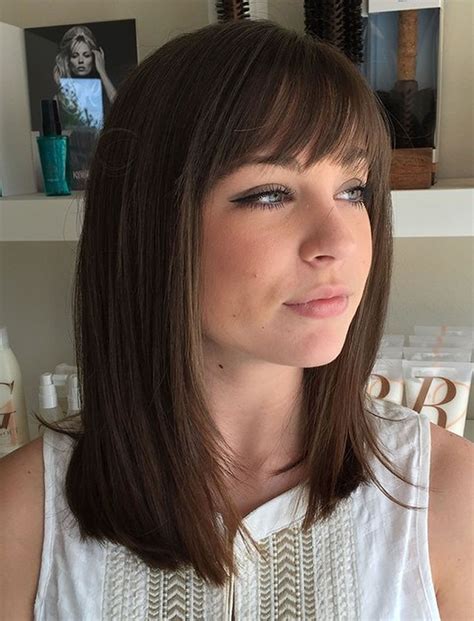 Get A Fresh Look With Medium Length Haircuts With Bangs