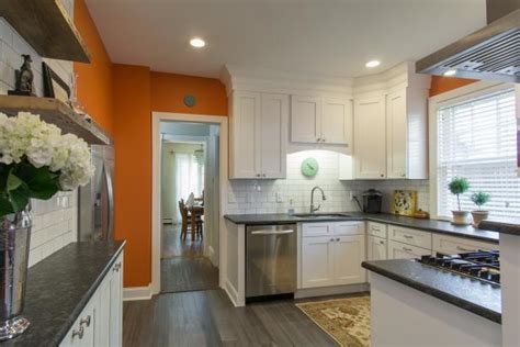 You can bring texture into your kitchen through tile, rugs, but even. Bright Transitional Kitchen With Orange Accent Wall and ...