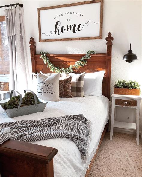 Add leaf art prints and antlers and you will feel like you're in a. Farmhouse Guestroom decor with old fashioned wood bed ...