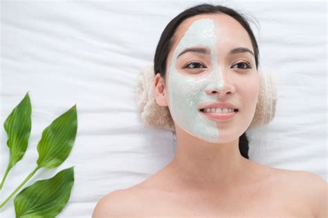 Woman Receiving A Relaxing Facial Massage Free Photo