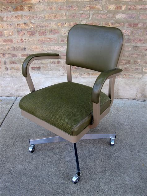 Conference chairs gaming chairs desk chairs for home office chairs kids desk chairs. circa midcentury: 'mid century' rolling green desk chair