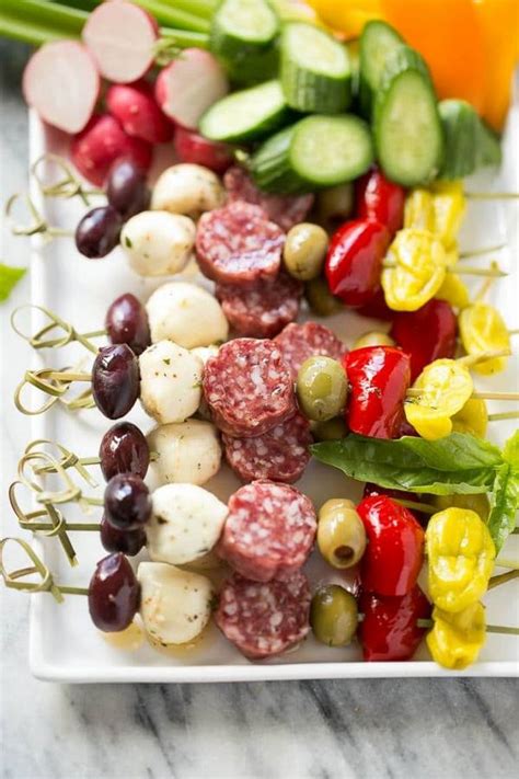 Creating the perfect antipasto platter means knowing what types of foods your guests enjoy and then combining them in a pleasing way on a nice platter. 15 Antipasto skewers recipes - easy appetizers and party food ideas