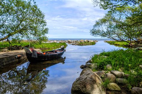 Sweden Rivers Boats Stones Grass Nature Wallpapers Hd Desktop