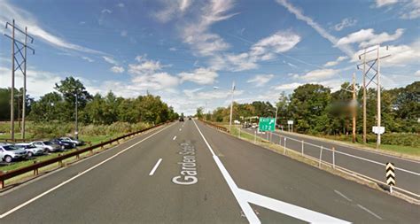 •interchanges with entrances and exits on both directions of traffic are marked. Garden State Parkway traffic slows down for 'saucer-like ...