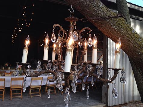 Barn Themed Wedding Hang Chandeliers From The Trees To Creat A