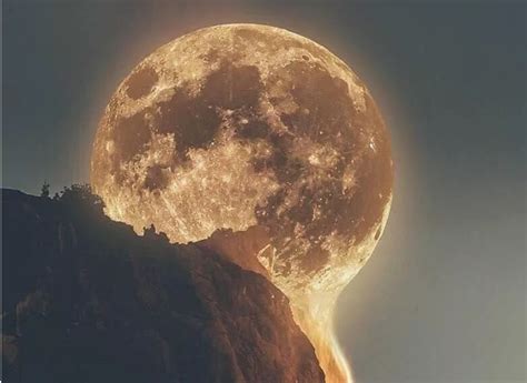 Is This A Lava Moon Melting Into A Waterfall