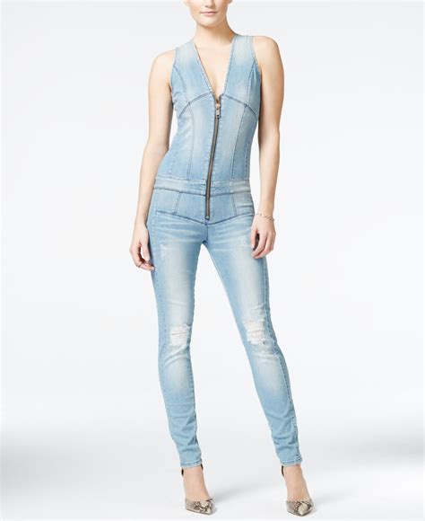 Lyst Guess Ripped Denim Zip Up Jumpsuit In Blue