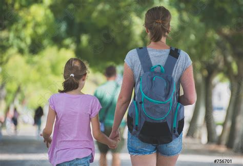 Mother And Daughter Walking In The City Back View Stock Photo Crushpixel