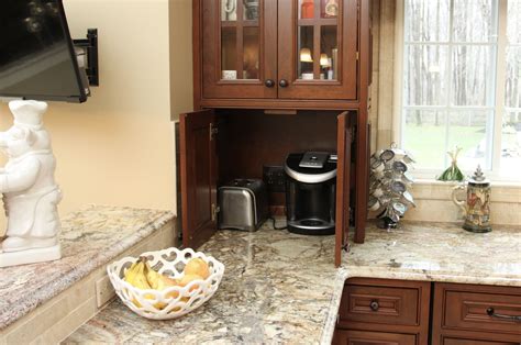 12 genius garage storage ideas to organize bikes, tools, and more. Appliance garage | Kitchen storage, Appliance garage, Kitchen