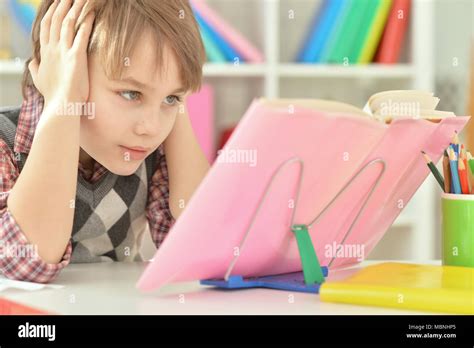 Boy Doing Homework Stock Photo Alamy