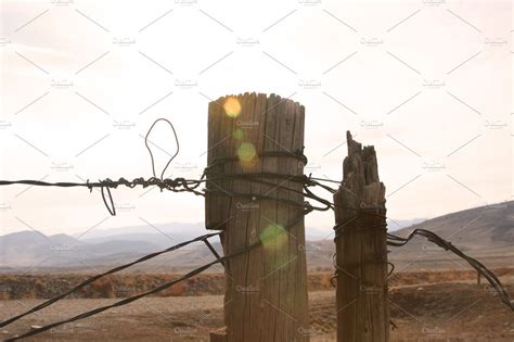 Barbed Wire & Post ~ Industrial Photos ~ Creative Market
