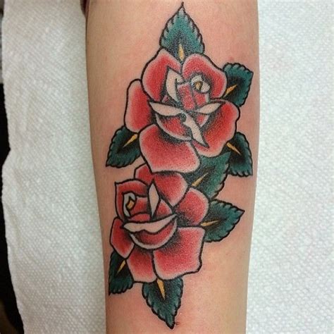Two fully bloomed roses can signify a relationship of love and affection. Double, traditional-style rose tattoo | Traditional rose ...