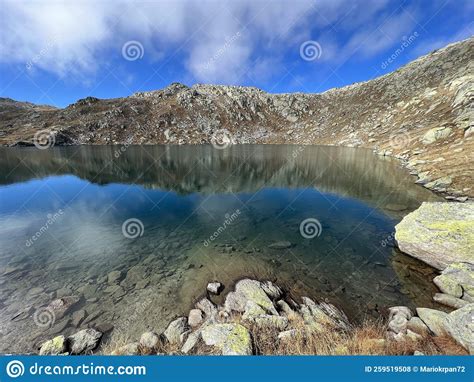 A Crystal Clear Alpine Lakes Laghi D`orsirora During A Beautiful Autumn