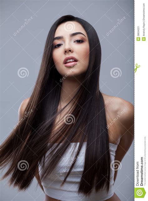 Beautiful Brunette Girl With Healthy Long Hair Stock Image