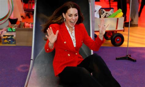 Kate Middleton Goes Down A Slide In Pumps Watch The Video