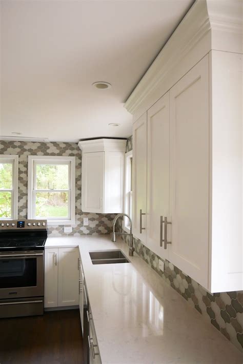 Provide a nailing surface for crown moulding by attaching solid wood mounting strips to the top edges of the cabinets. Cabinet Crown Molding » Rogue Engineer
