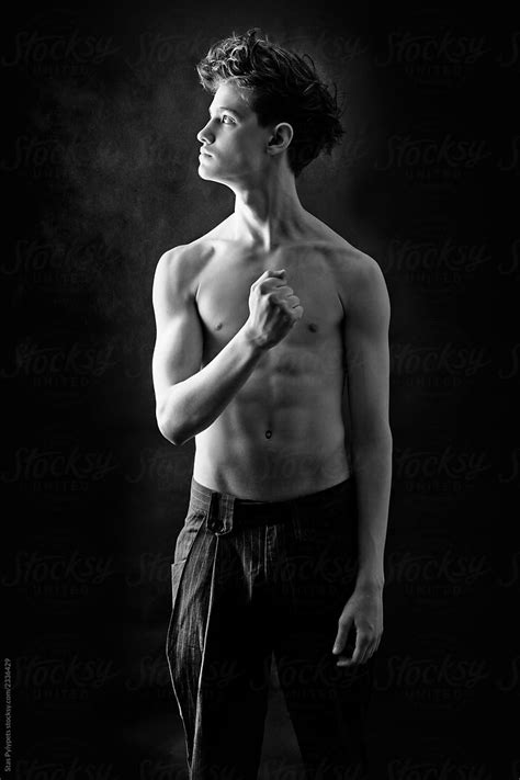 Black And White Portrait Of A Naked Guy Del Colaborador De Stocksy