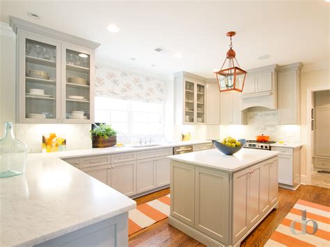 Natural granite a beautiful natural granite (one of my favourites, i have to say) with varying tones of grey add some white accents to further lighten the colour scheme. Gray Kitchen with Orange Accents - Contemporary - Kitchen