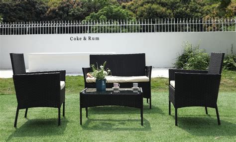Maybe you would like to learn more about one of these? Four-Piece Black Rattan Garden Furniture Set | Groupon