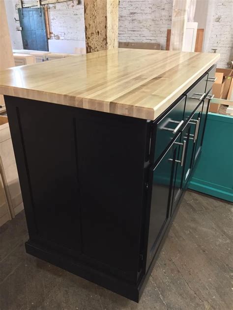 Maybe you would like to learn more about one of these? Item E60 Kitchen island with seating Butcher Block Top ...