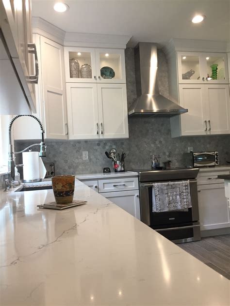 New White Kitchen With New Quartz Countertops And Cabinetry Kitchen