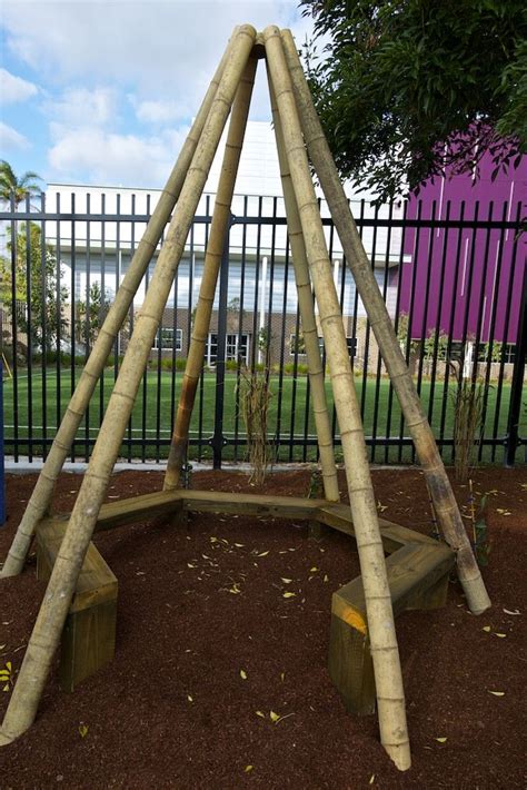 A Large Bamboo Teepee Seat Is Ringed With Sensory Plantings And
