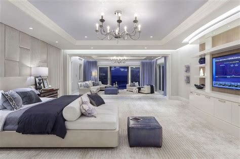 Contemporary Master Bedroom With Sitting Area Tray Ceiling And Purple And White Decor Dream