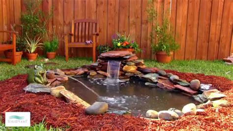 We installed a rubber pond liner and put sone flat granite rocks around the edge to define the edge. How to Add a Small Waterfall to Your Pond - YouTube