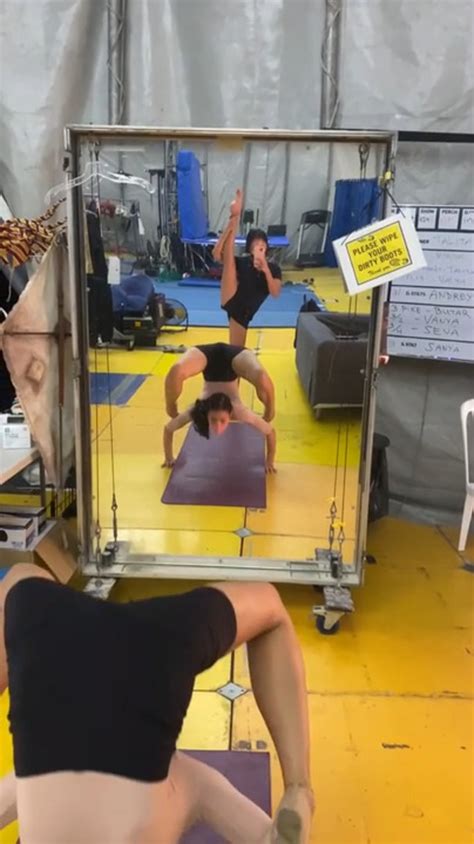 Contortionist Does Push Ups In Handstand While Bending Her Legs