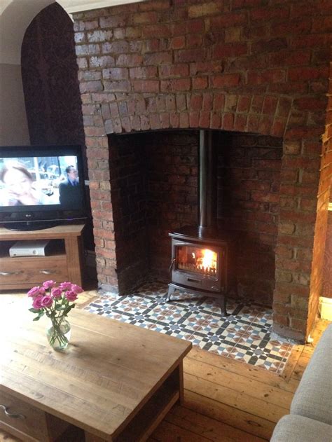 How to finish area around wood stove? Wood burning stove and tiled hearth. Fire Is a Tiger ...