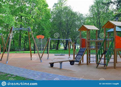 Colorful Playground With Swings And Slides Stock Photo Image Of