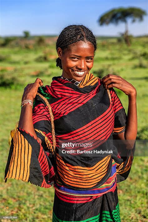 Young African Woman Carrying Water From The Well Ethiopia Africa High