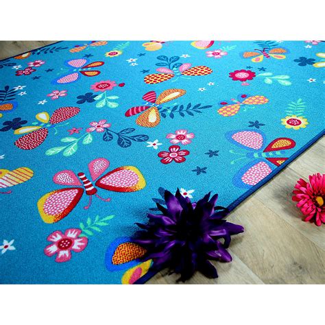 Im online shop von teppich4kids können mama und papa viele schöne farben und bunte muster bestellen: Kinder Spiel Teppich Schmetterling, türkis, Snapstyle ...