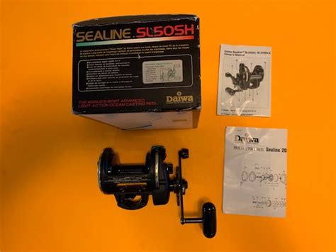 DAIWA SEALINE SL50SH CONVENTIONAL FISHING REEL WITH THE BOX PAPERWORK